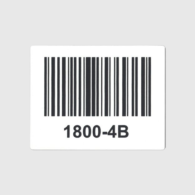 White/black tag displaying a bar code and text