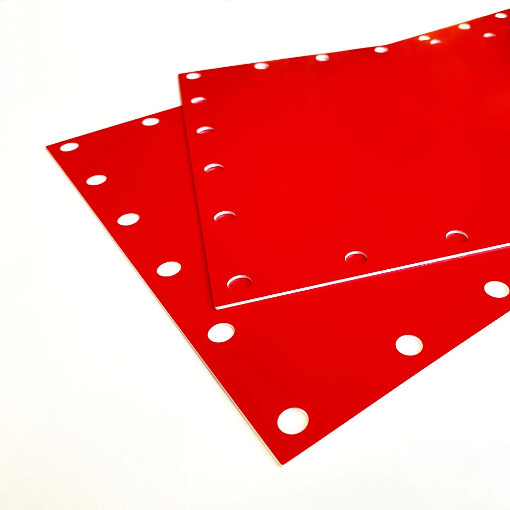 Two rectangular acrylic templates with holes cut along their perimeters and identification engraved in their centers